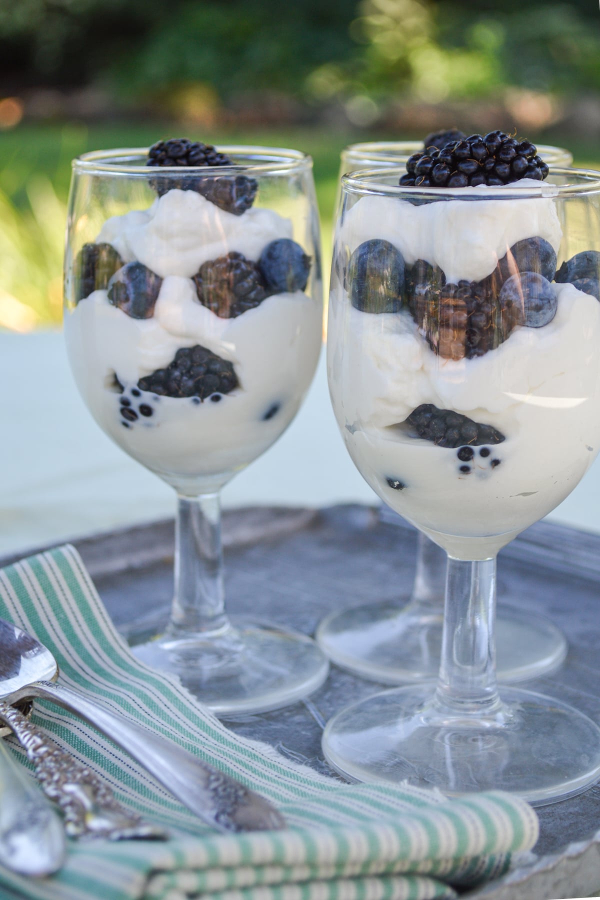 berry parfait recipe in glasses outside