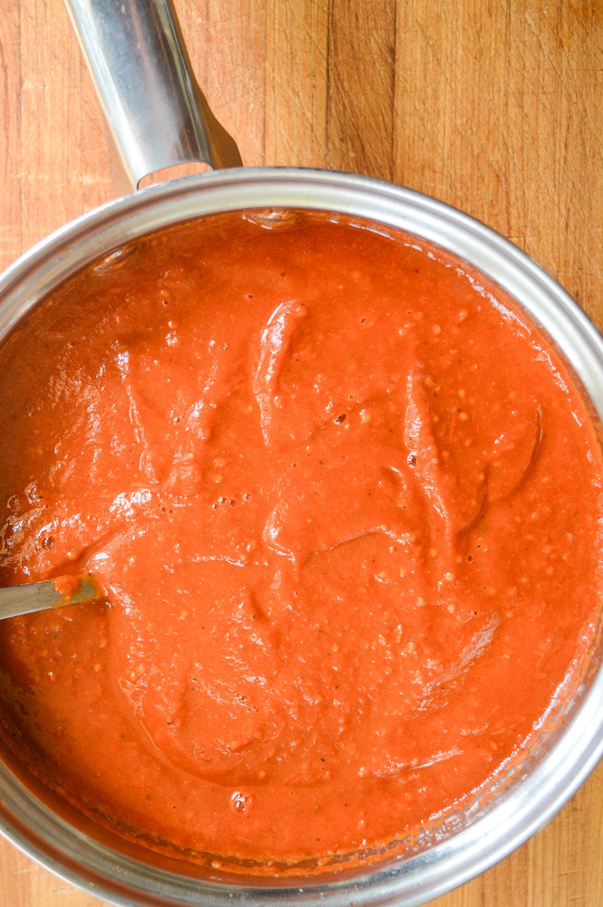 pot of thick roasted cherry tomato sauce