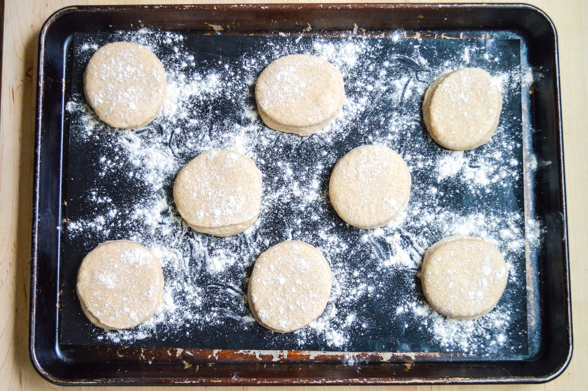 english muffin rounds on cookie sheet