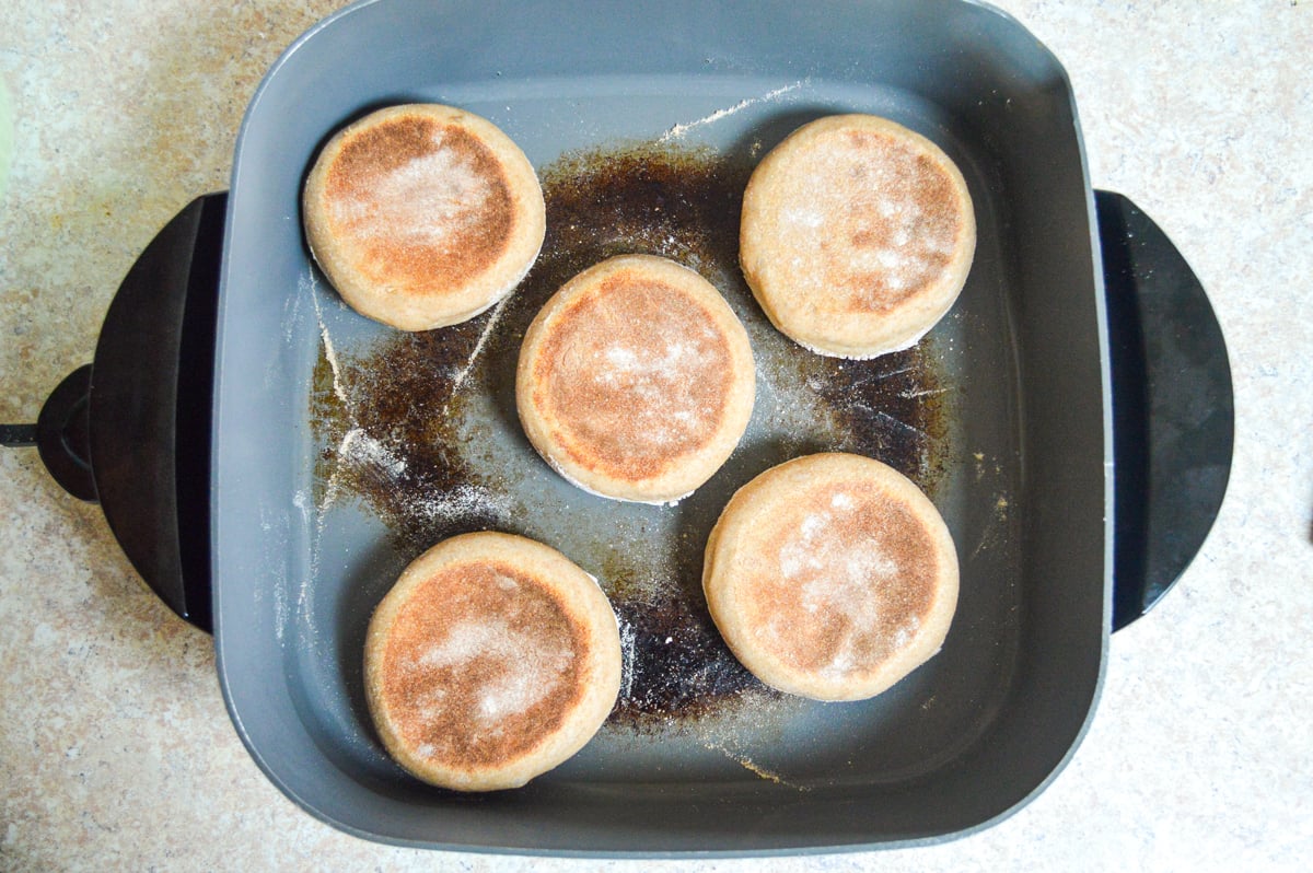 cooking english muffins in skillet