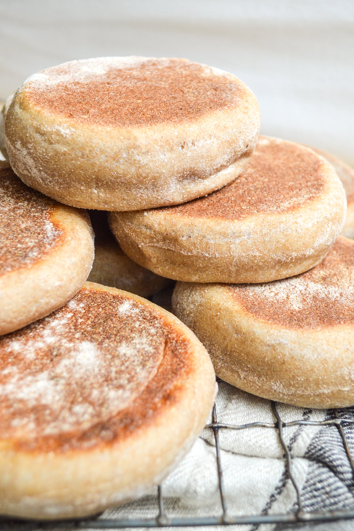 baked english muffins on a rack