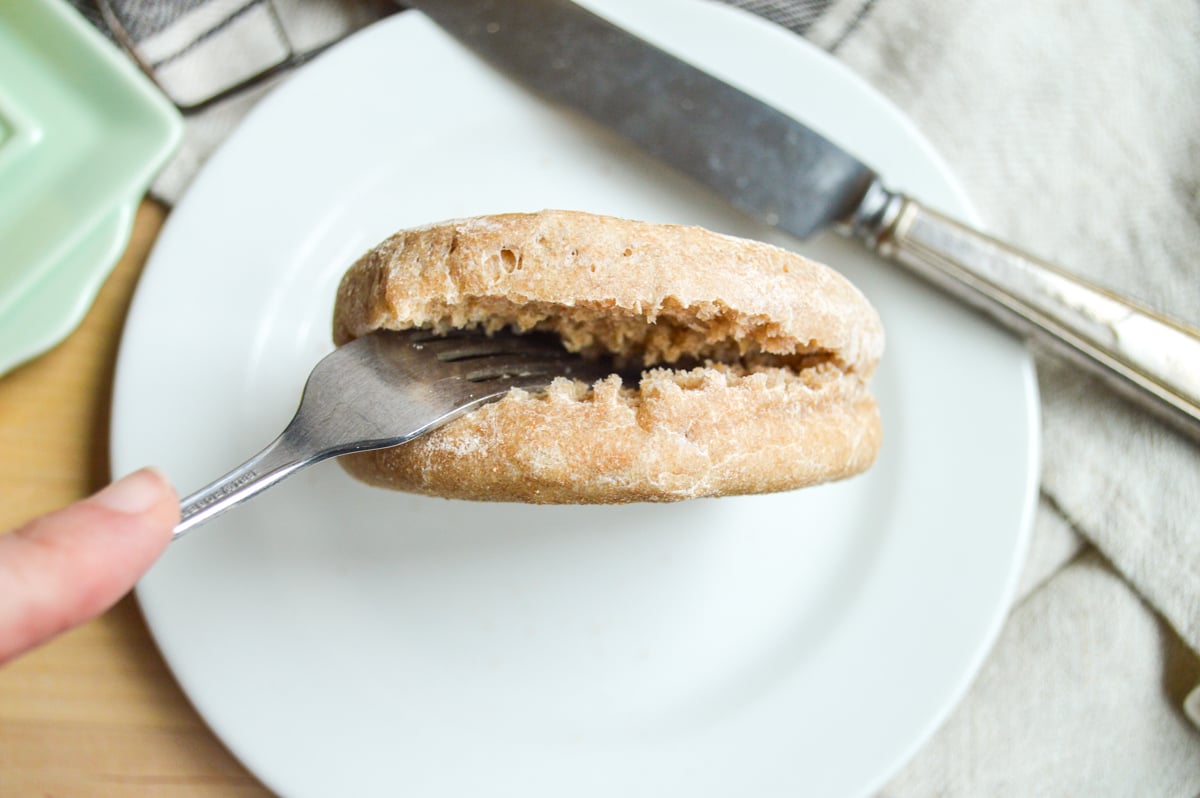 using a fork to split an english muffin