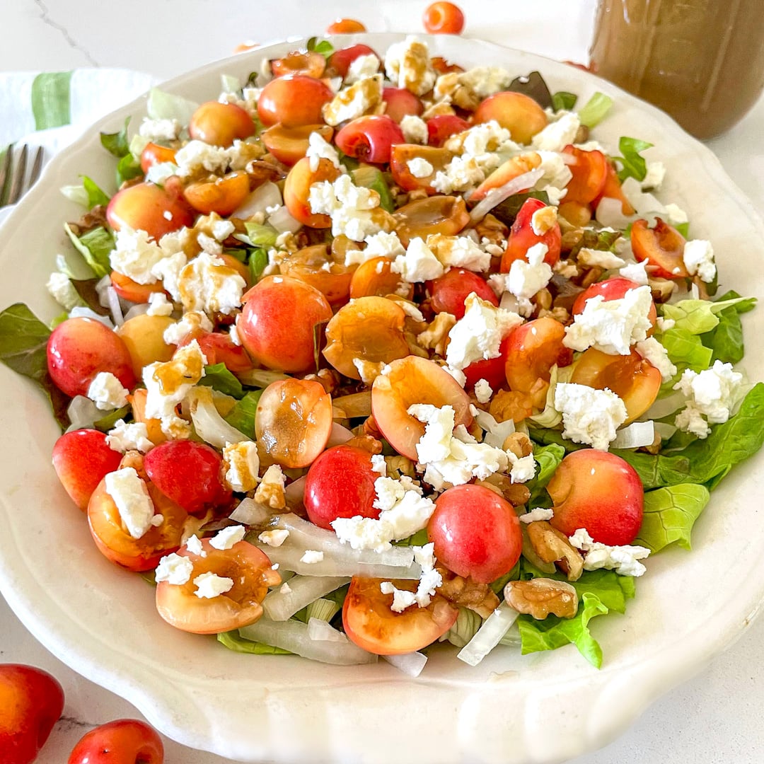 cherry salad with feta and walnuts on platter