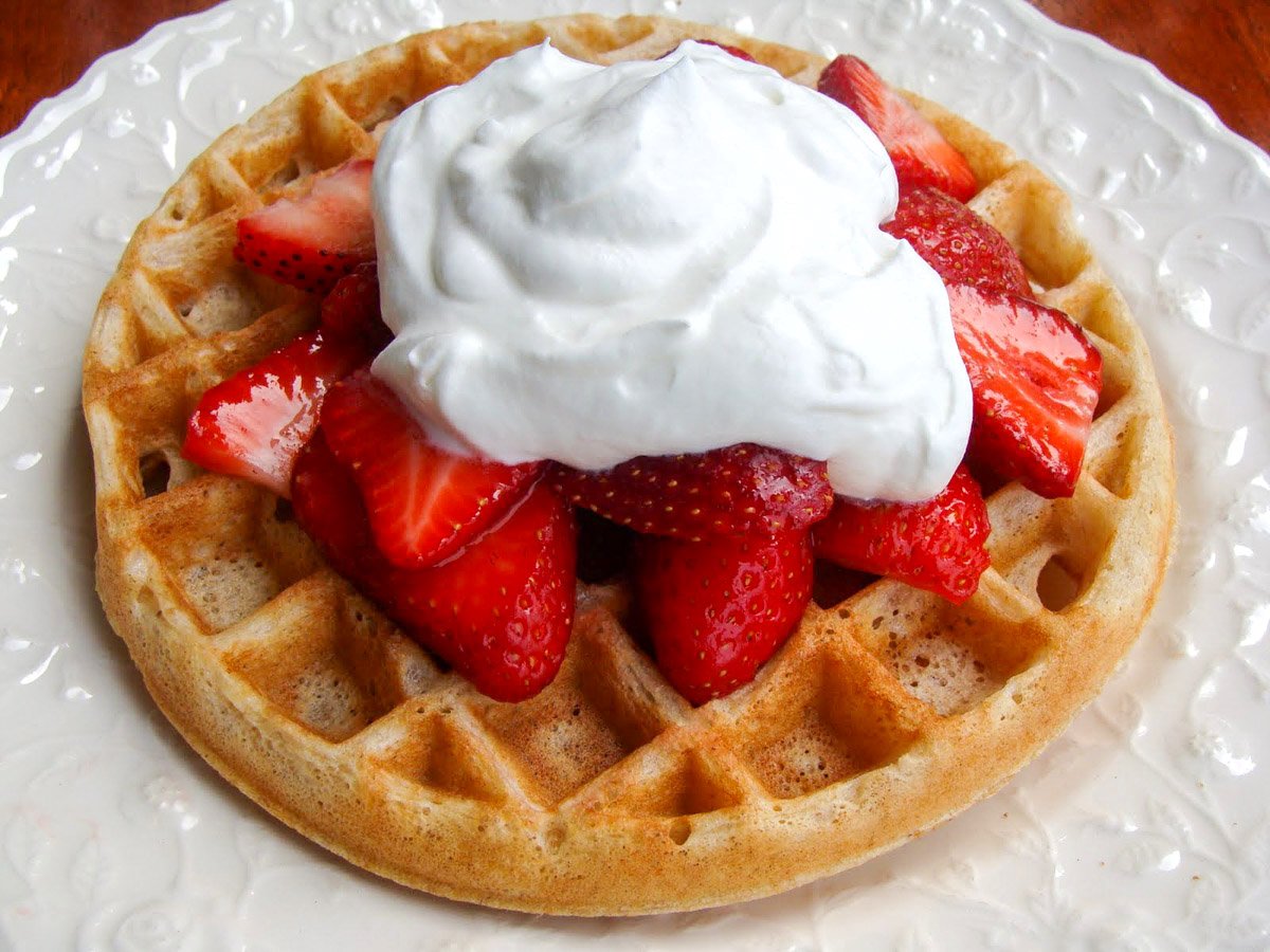 waffles with strawberries and whipped cream