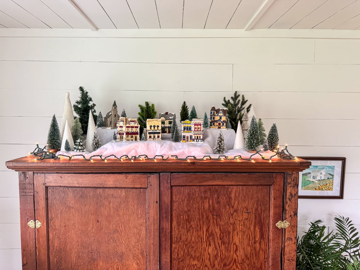Close up of Christmas village on cabinet