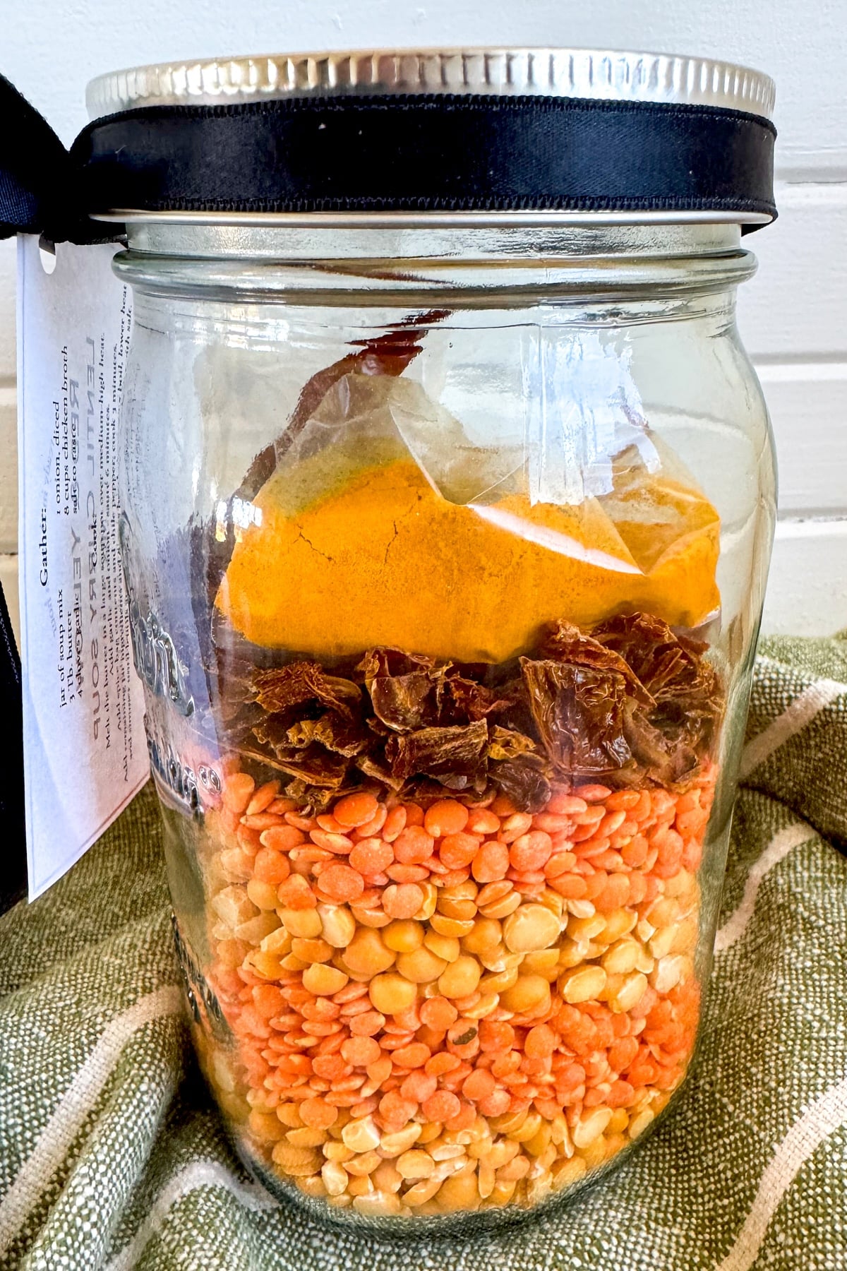 layers of ingredients in jar for soup mix