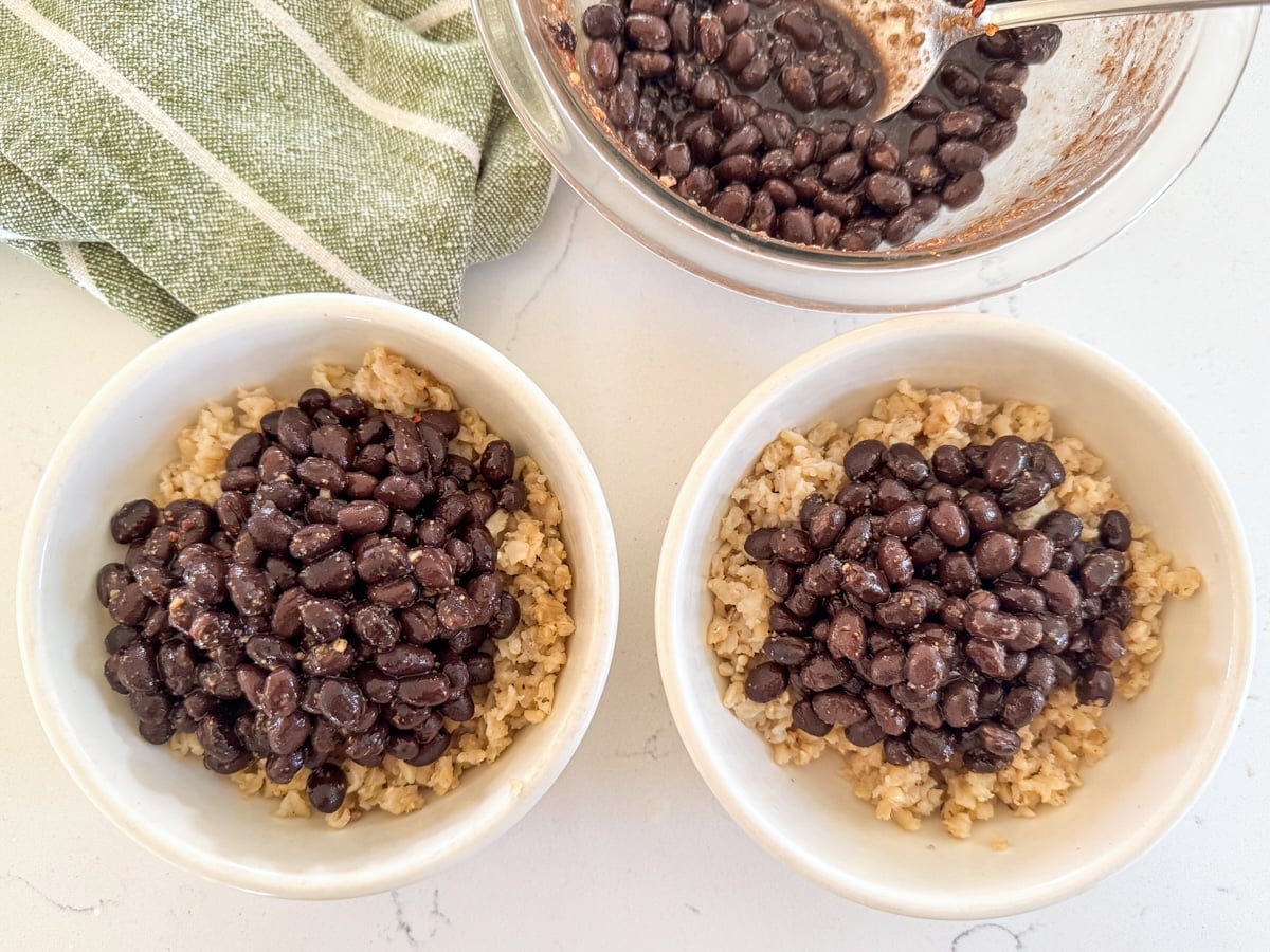 portioning rice and beans in bowls