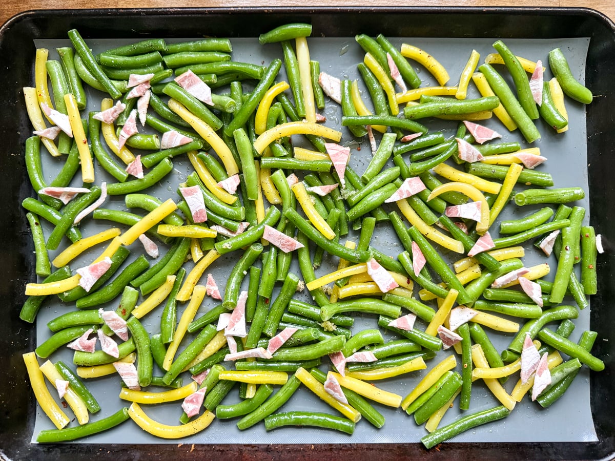 tossed and spread green beans on baking sheet