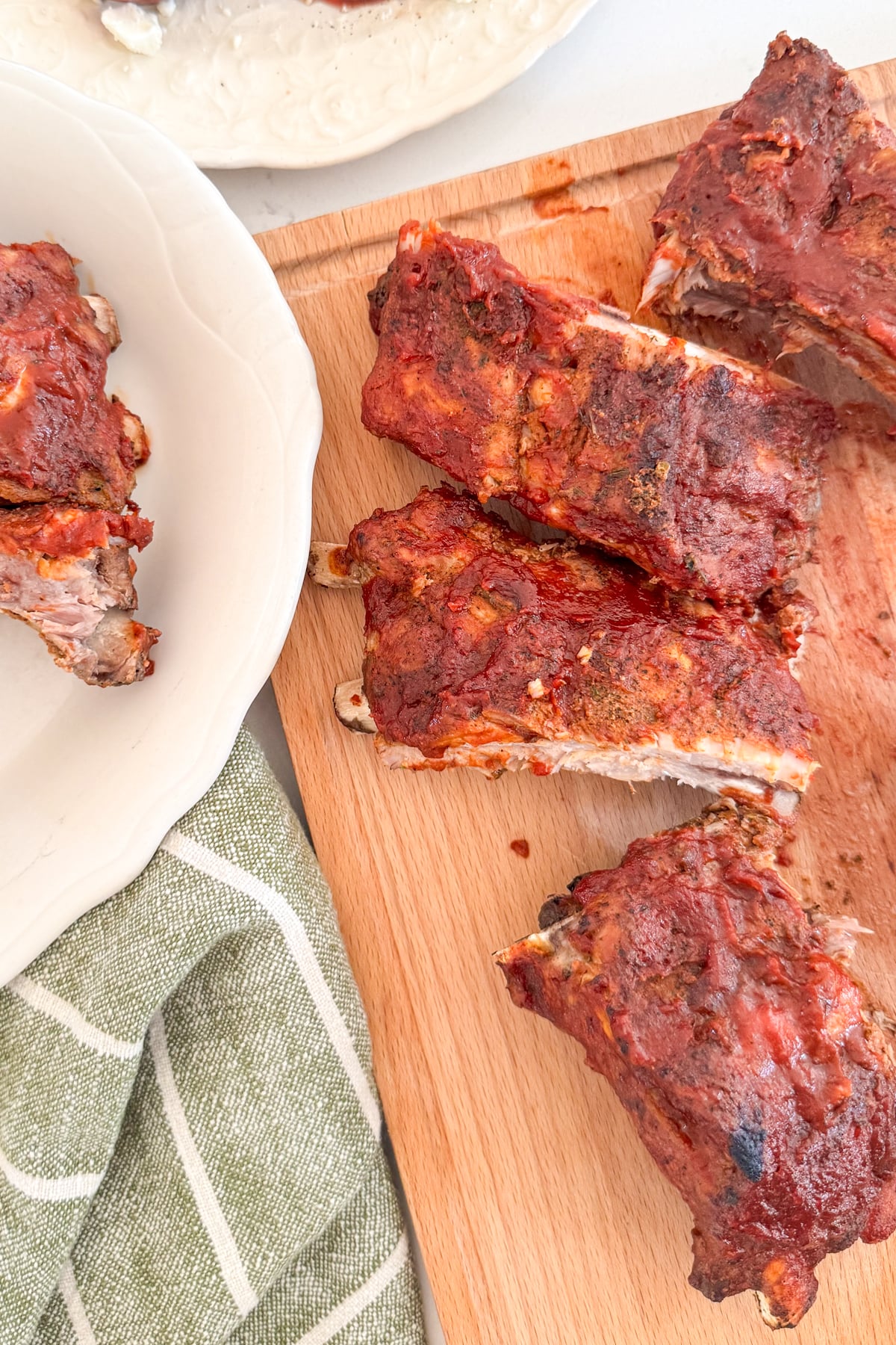 bbq rib sections on cutting board