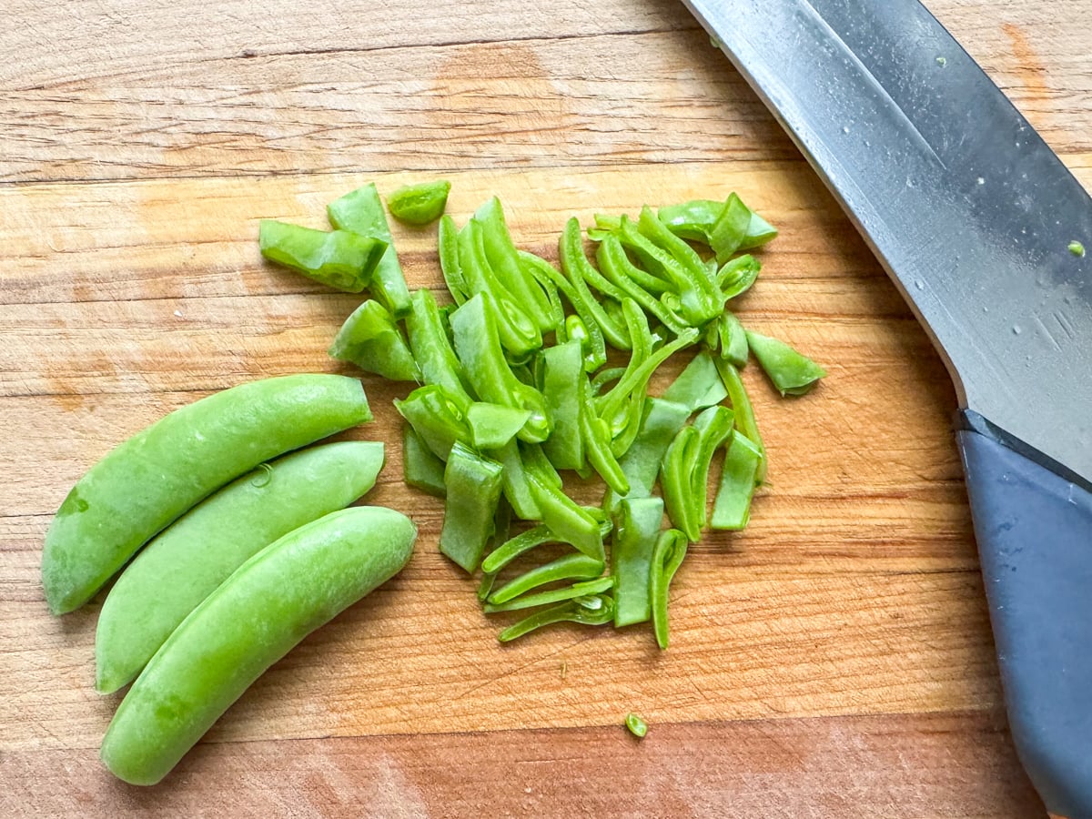 slicing snap peas