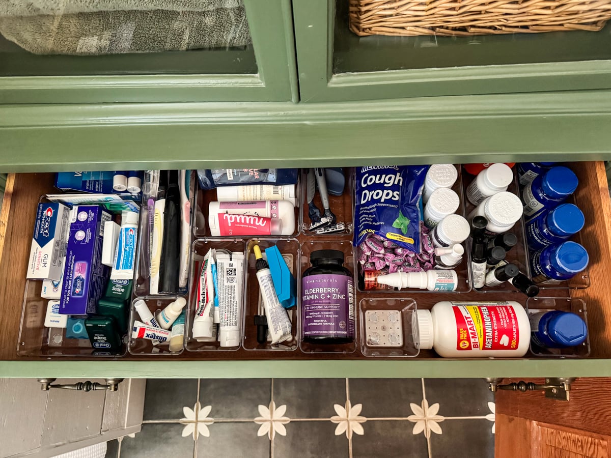 organized bath drawer with clear storage containers