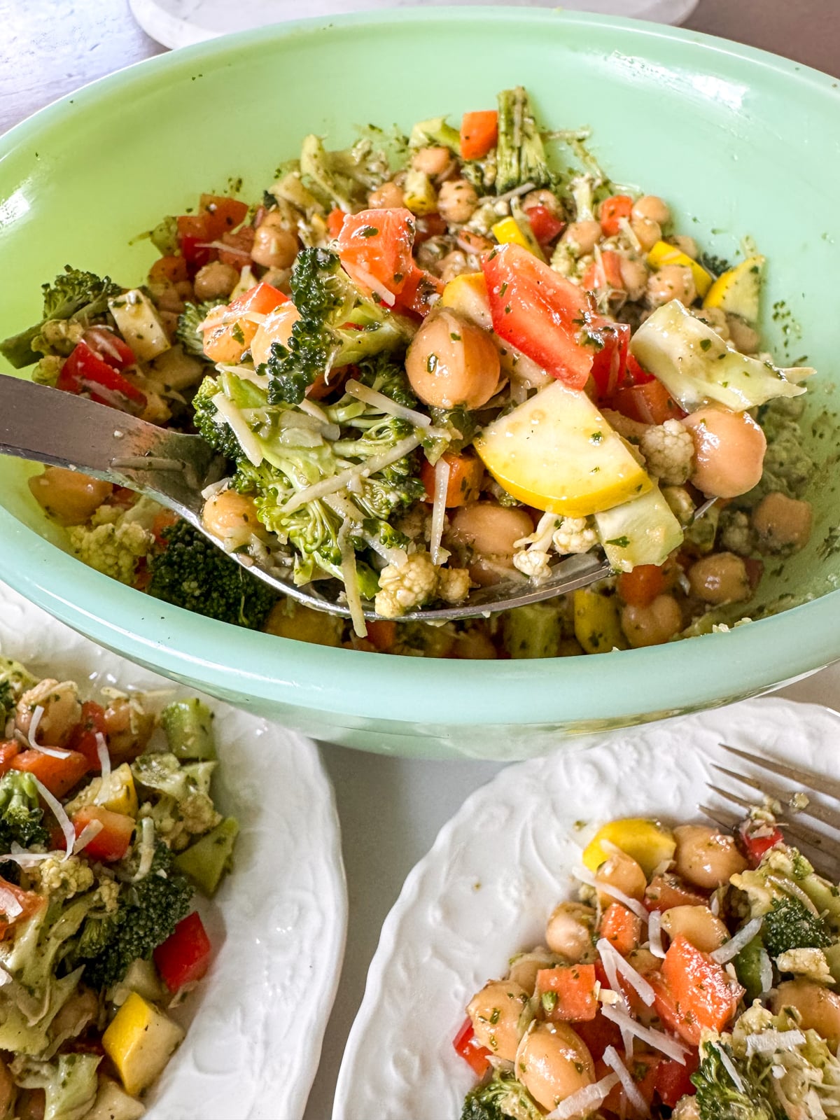 serving chopped salad with pesto vinaigrette