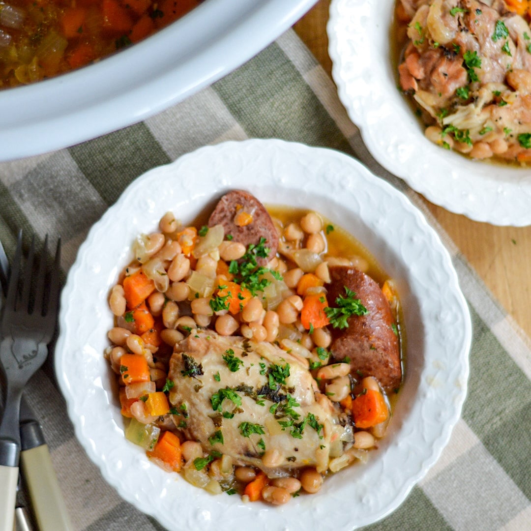 chicken sausage cassoulet in white bowl