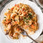 Thai style peanut spaghetti squash recipe on white plate with fork