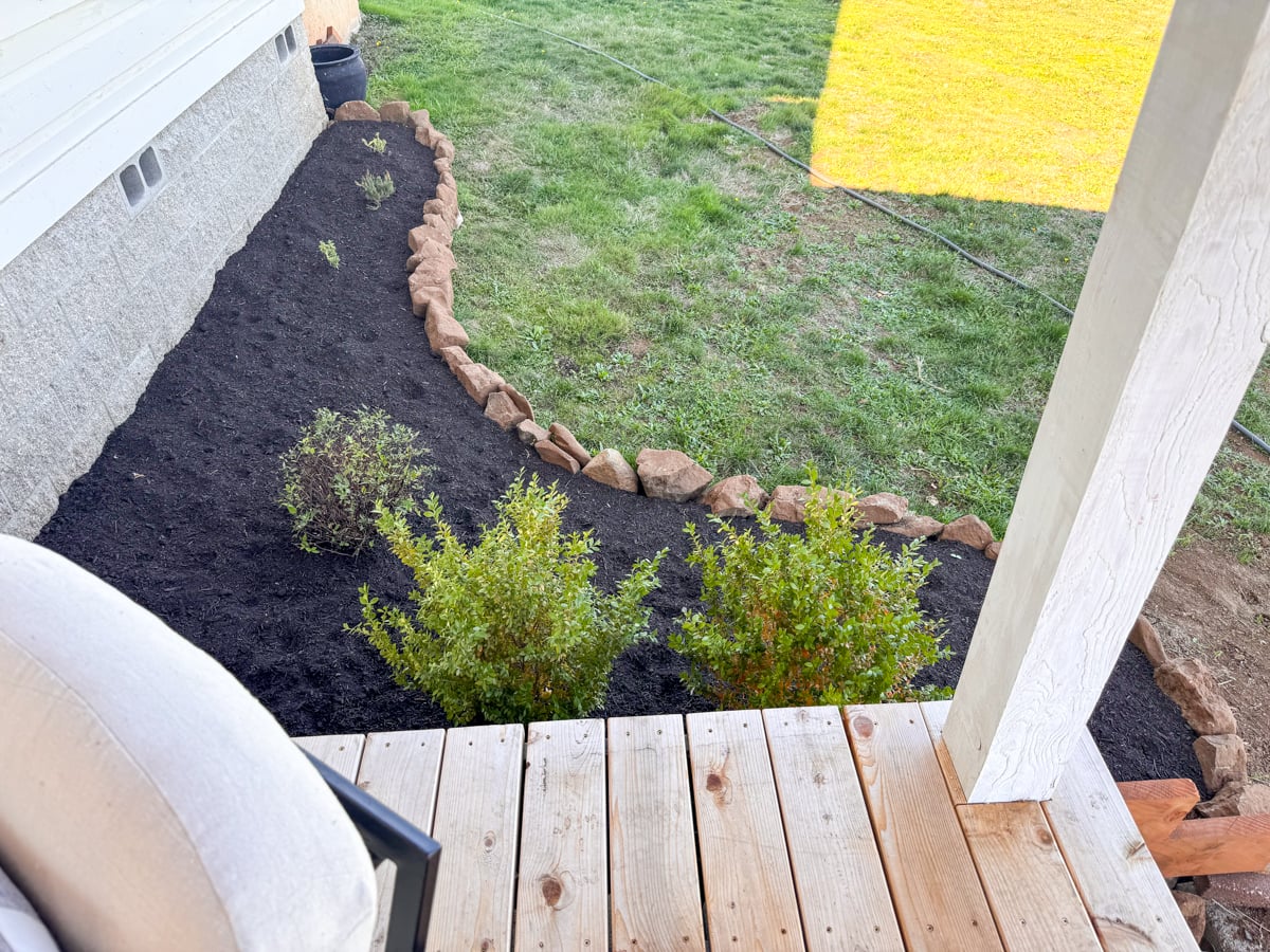 planted side garden along porch